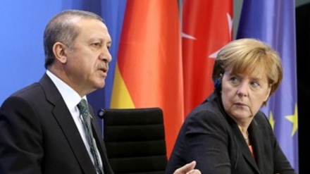 Merkel'den Erdoğan'ın uyarısına tepki 