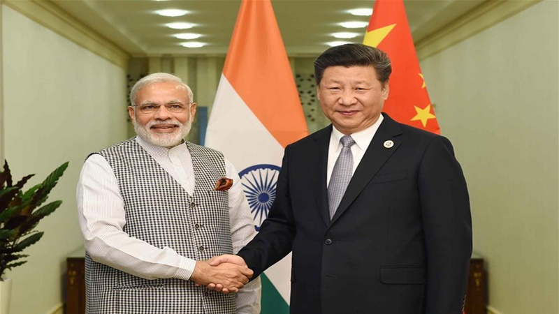 23 जून 2016 को ताशक़न्द में भारतीय प्रधान मंत्री नरेंद्र मोदी और चीनी राष्ट्रपति शी जिन पिंग के बीच मुलाक़ात की तस्वीर
