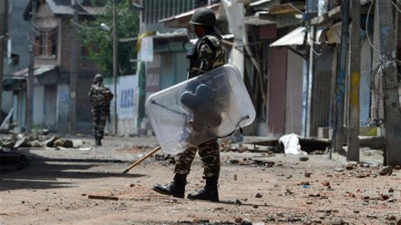 Dozens injured as Kashmiris protest teacher's killing by Indian forces