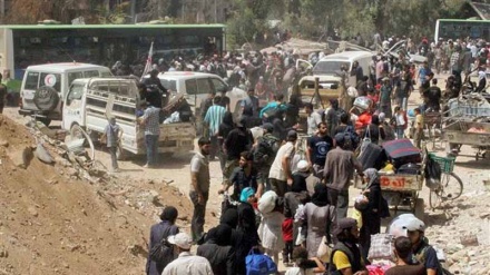 Terrorists, residents leaving besieged Damascus suburb of Darayya