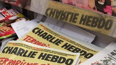 Italy town sues Charlie Hebdo over insulting earthquake cartoons 