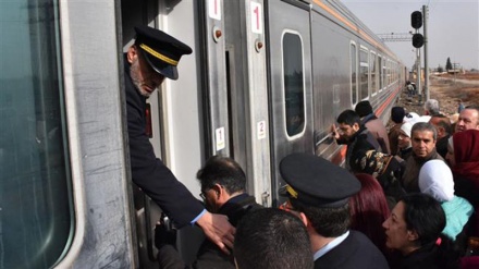 Syrians ride first train across Aleppo after liberation