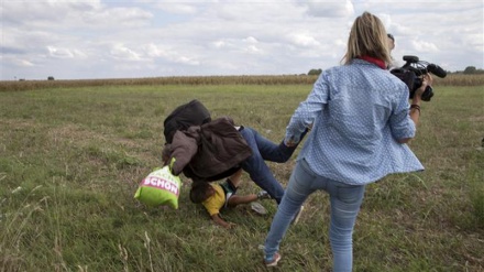 Hungarian court sentences journalist to probation for kicking refugees