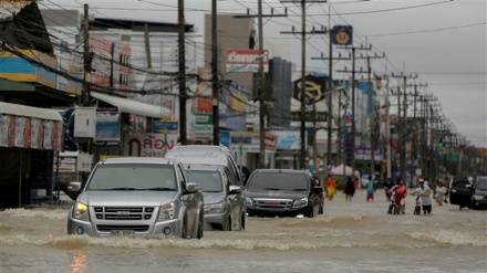 A dozen dead in floods triggered by rains in southern Thailand