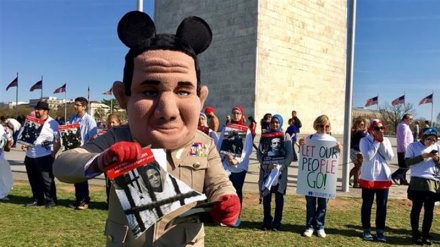 Americans hold demonstration ahead of Trump-Sisi meeting