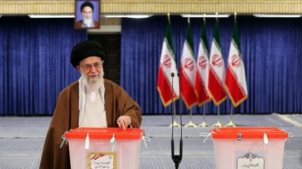 Leader casts vote in twin elections