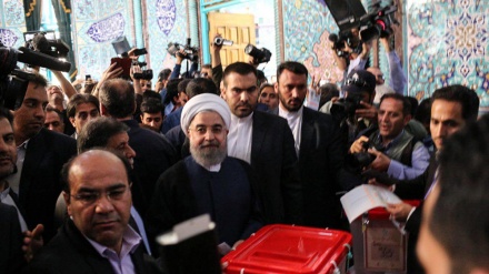 Hassan Rouhani casts his votes 