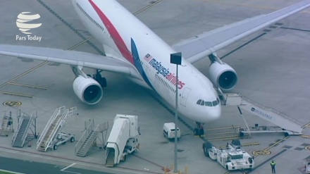 Malaysian plane returns to airport after false bomb threat