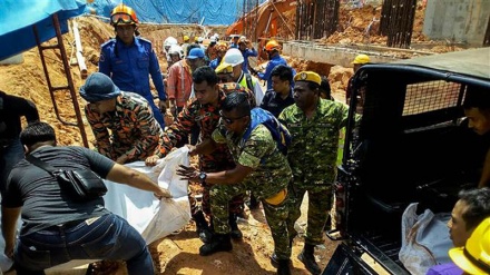 Fourteen feared dead in Malaysian landslide