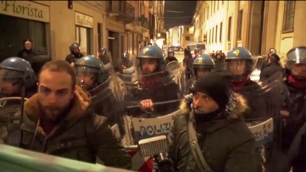 Italian police clash with anti-fascist protesters outside right-wing memorial demo