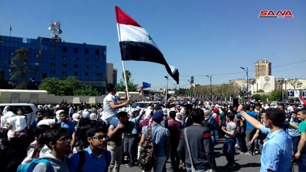 আসাদের সমর্থনে দামেস্কে মিছিল; ক্ষেপণাস্ত্র হামলার প্রতিবাদ