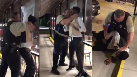 US police officer under investigation after seen choking black man