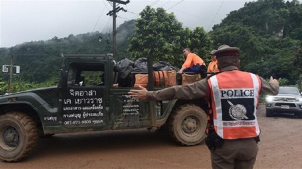 Four of trapped Thai schoolboys rescued from flooded cave