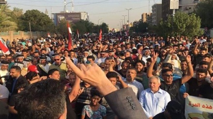 Bə İraği dıvləti təşkil karde prosessədə bıə Amerkə mıdoxiləon etıroz karde xoto İraği milləti aksiya. 