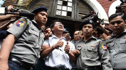 Myanmar sentences Reuters journalists to 7 years in jail, prompts reactions