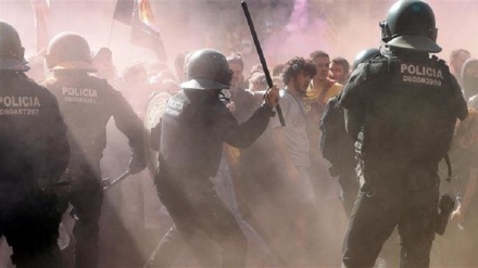 Police clash with protesters on day of demos in Barcelona