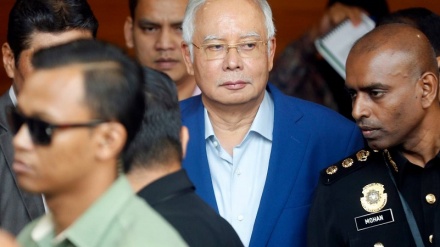 Malaysia's ex-premier charged with money laundering, abuse of power