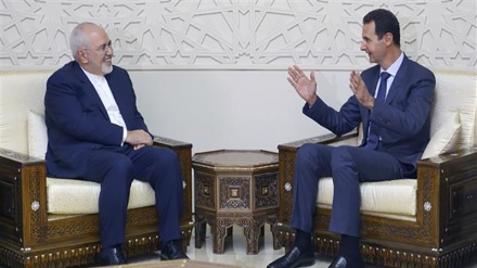 Zarif e Assad afirmam que a pressão do Ocidente não conseguiria impedir a luta contra terrorismo Irã-Síria