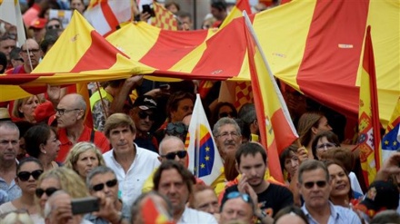 Catalans march for unity on Spain’s national day 