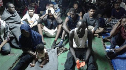 Libya forcibly evicts stranded refugees from cargo ship