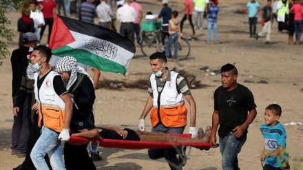 ガザ地区国境で、パレスチナとの国際的な団結を訴えるデモ行進が実施