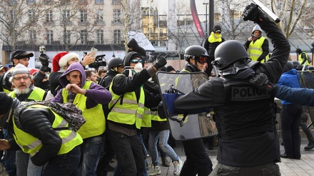 Chalecos amarillos vuelven a protestar en las calles de París(video+fotos)