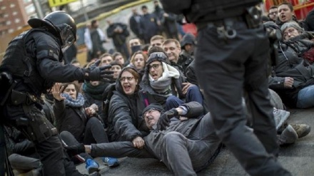 Police clash with protesters taking part in Catalonia strike