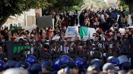 Thousands of Algerians protest against President Bouteflika’s bid for another term