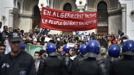 Algerian protesters reject interim president