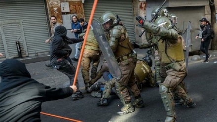 Rocks, tear gas fly in Chile on Allende Coup anniversary