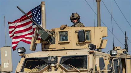 US military convoys cross back into Syria from Iraq: Observatory 