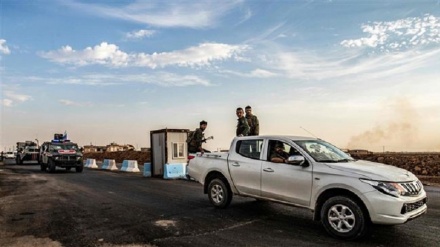 Kurdish forces in northeast Syria begin withdrawal along Turkish border