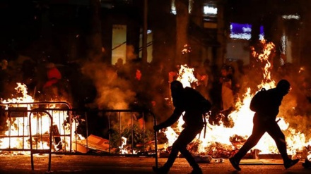 Street fires erupt in Barcelona in fourth day of Catalan protest