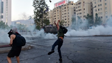 Manifestantes chilenos chocan con policía antidisturbios(Fotos+Video)