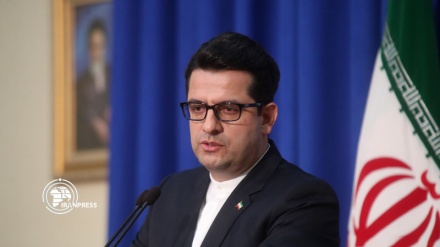 Iranian illegally detained in Germany returns home with FM Zarif