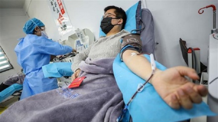 China reports drop in new virus infections despite fatality increase