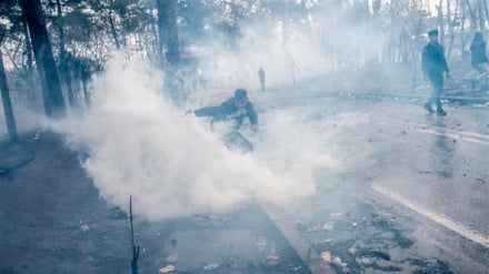 Greece fires tear gas at refugees at border crossing with Turkey