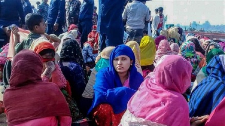 Women in Bangladesh promote hygiene in refugee camps amid coronavirus fears