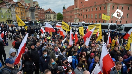 Польшада карантин сабабли эътирозли кўча намойишлар ўтказилди (фотожамланма)