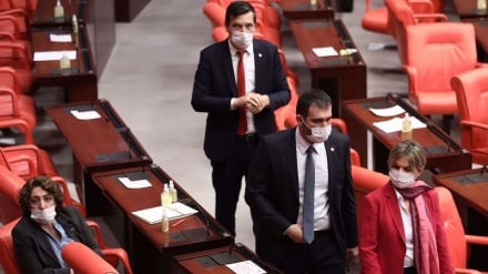 Turkish parliament strips status of two pro-Kurdish lawmakers, one MP from main opposition party