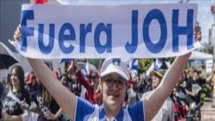 Hondureños protestan contra el presidente Juan Orlando Hernández