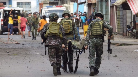 Twin blasts kill at least 10, wounds dozens in southern Philippines