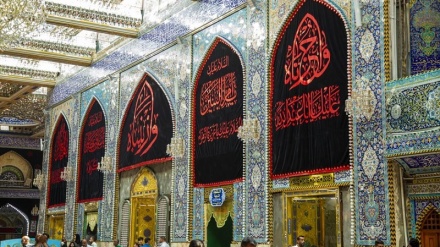 Зарих в гробнице Имама Хусейна облачен в черные материи