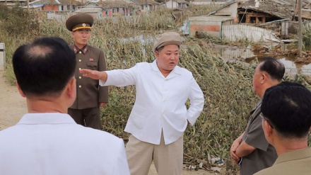 North Korean leader visits typhoon-hit area, orders recovery efforts
