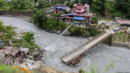 Landslide, flash floods kill 12 in Nepal, dozens missing