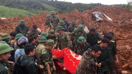  Landslide hits barracks in Vietnam, killing 14, leaving 8 missing 