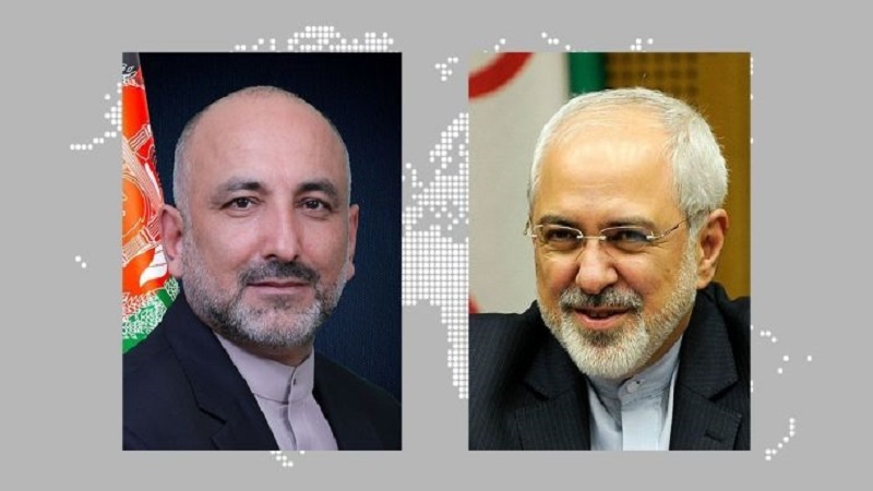 قدردانی حنیف اتمر از نقش وزیر خارجه ایران در توسعه روابط میان دو کشور