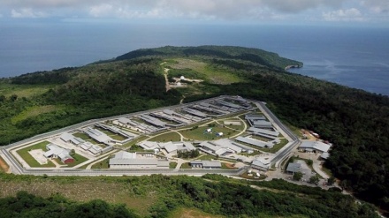 Australia vows to 'restore order' as riots erupt on immigration detention island