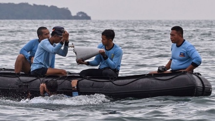 Indonesia finds body parts, debris at Boeing plane crash site