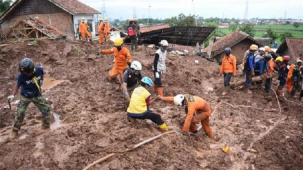 Indonesia landslides kill 13, dozens missing